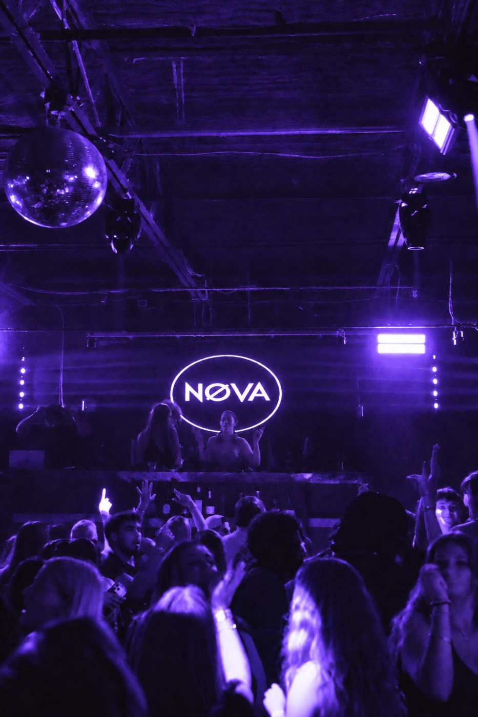DJ booth under the NØVA sign